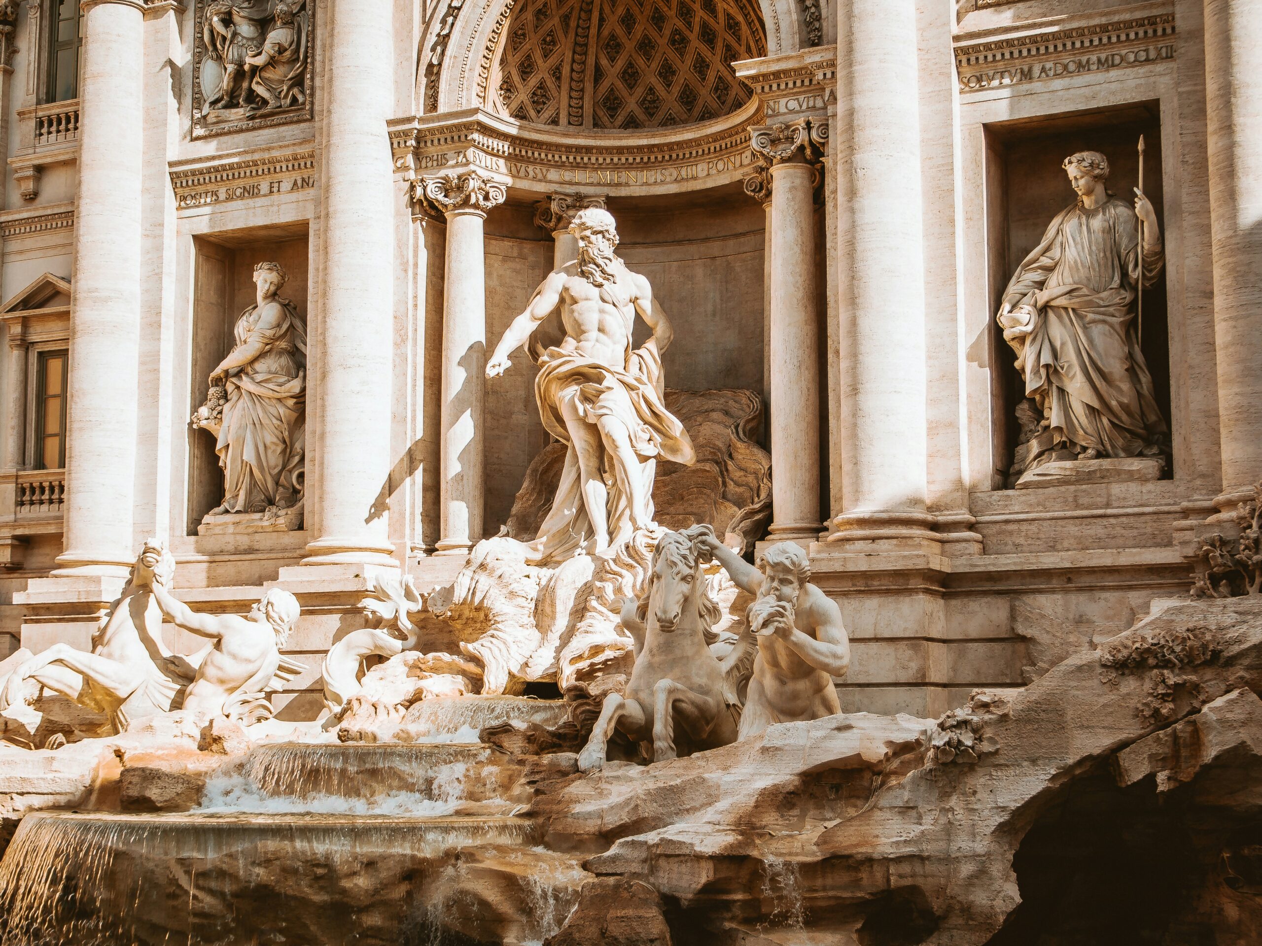 Rome travel guide: Trevi Fountain Neptune baroque sculptures marble Rome Italy