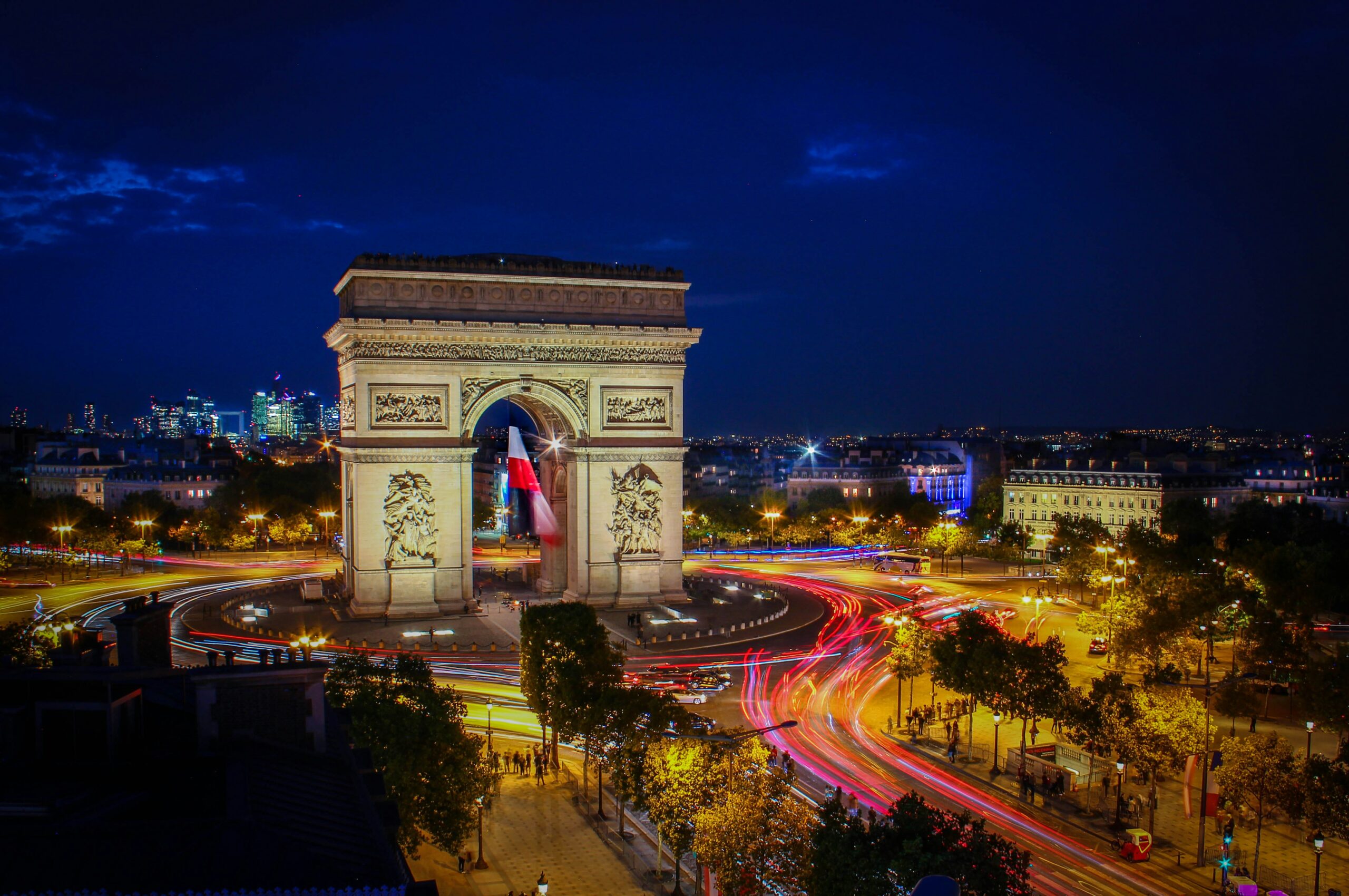 Paris travel guide: Arc de Triomphe night light trails Champs-Elysees long exposure