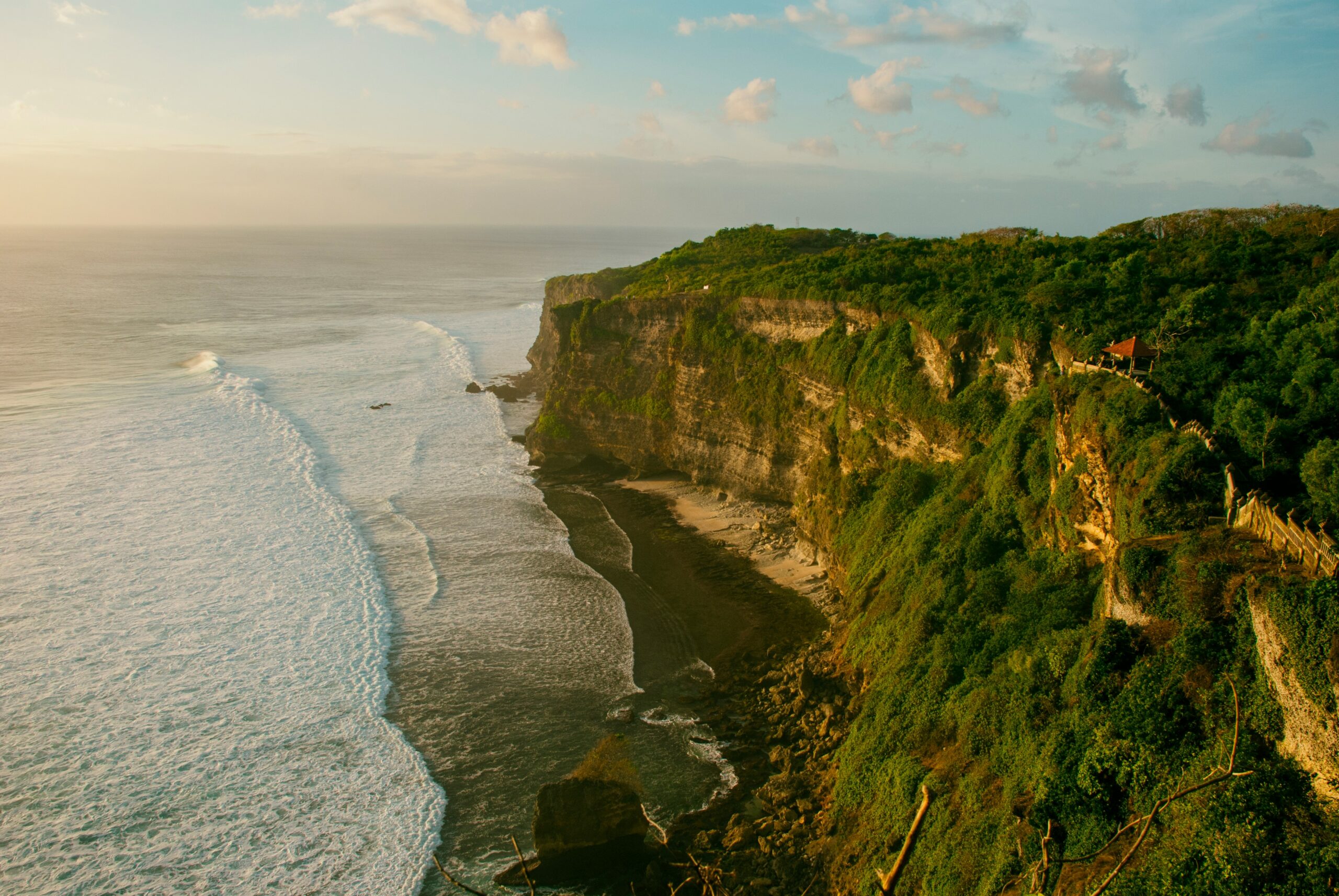 Bali travel guide: Uluwatu cliffs aerial view Indian Ocean waves Bukit Peninsula