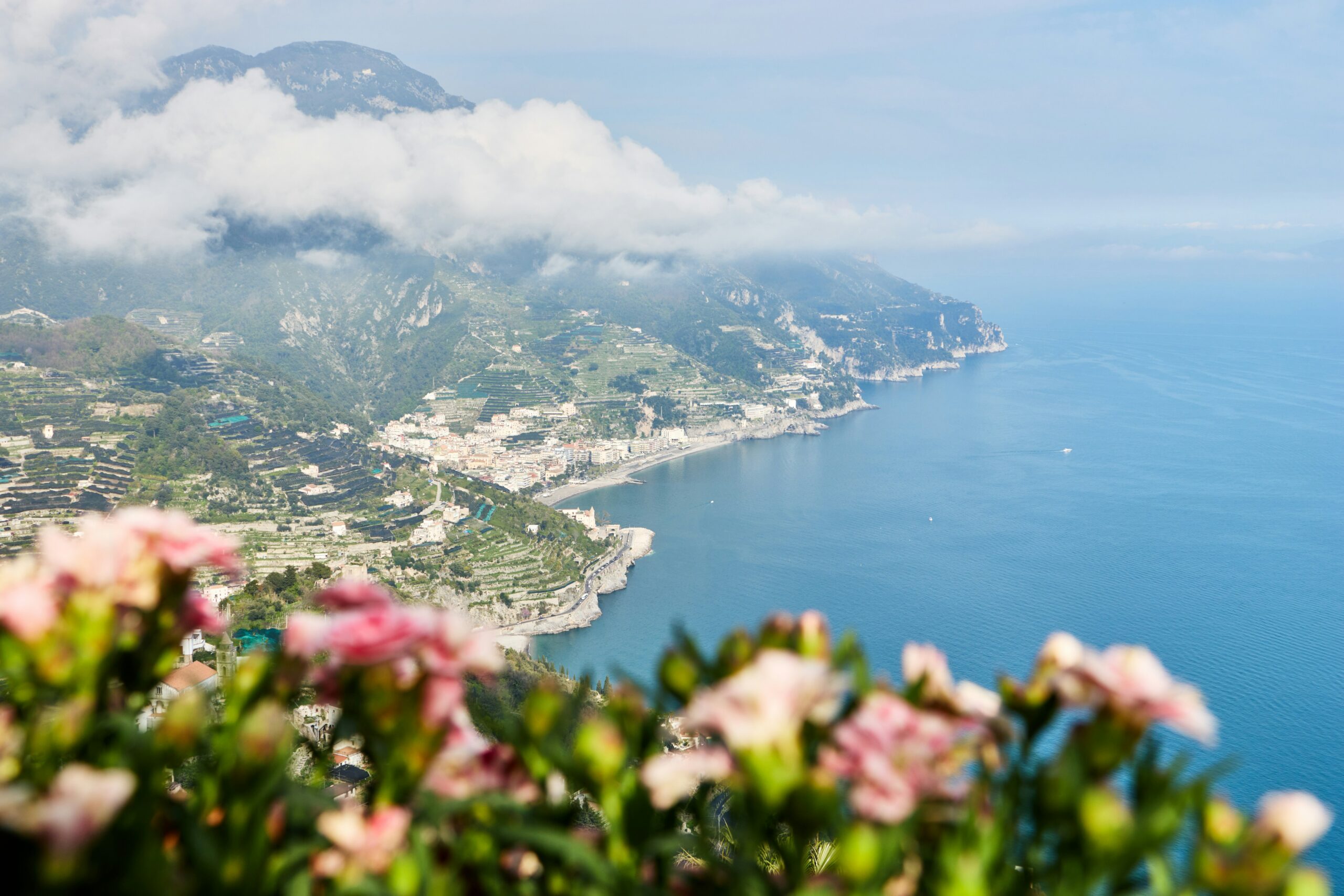 Amalfi Coast travel guide: Ravello panoramic view coastline terraces sea flowers Italy