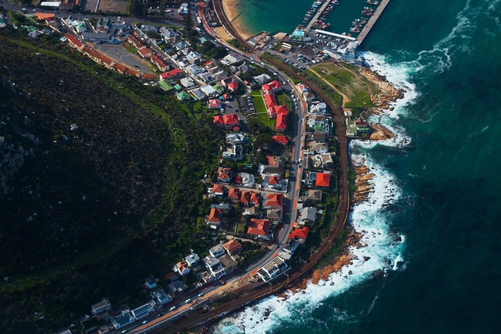 Cape Town travel guide: aerial view coastal suburb mountain ocean Atlantic Seaboard