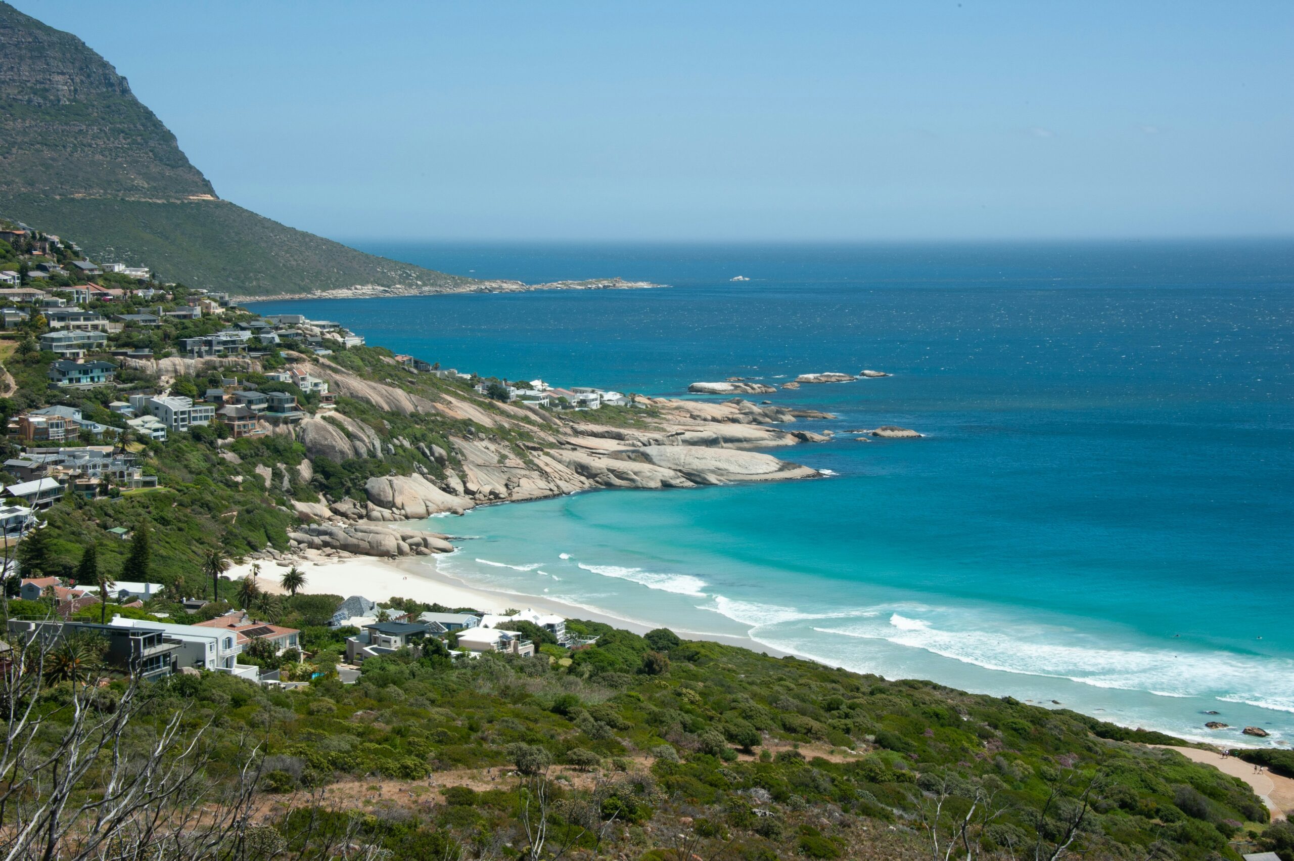 Cape Town travel guide: Llandudno Beach turquoise water Atlantic coast mountain backdrop