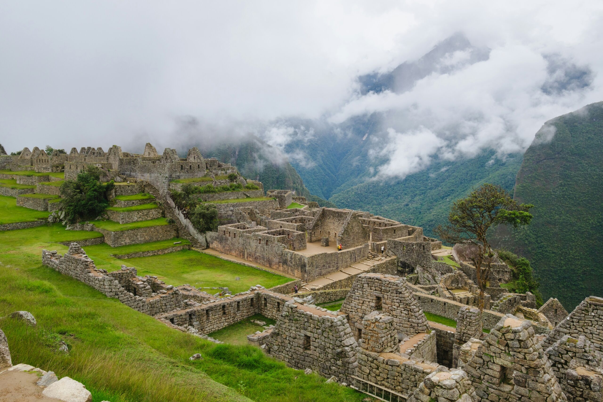 Machu Picchu travel guide: Inca citadel stone ruins terraces cloud forest mountains Peru