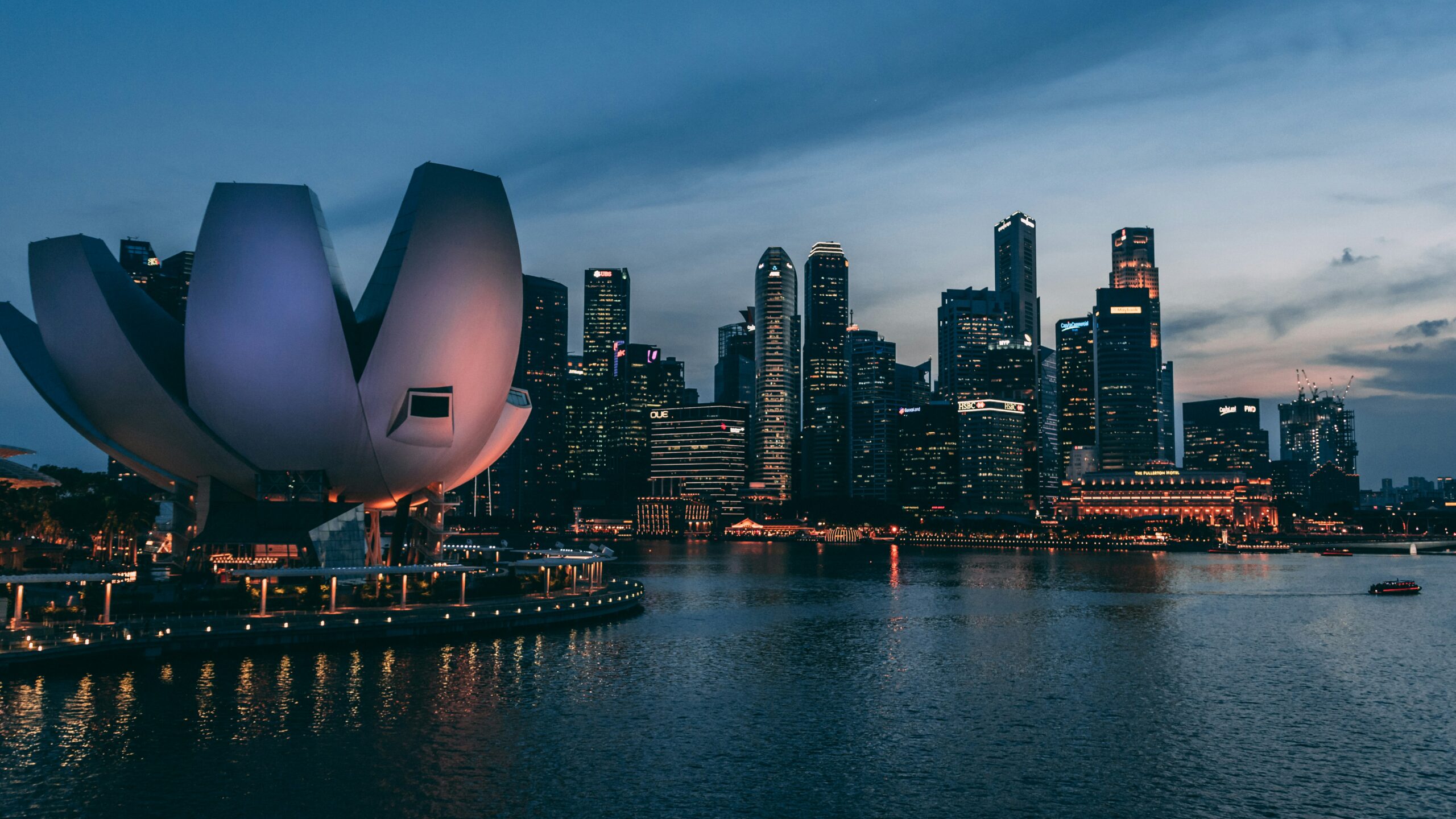 Singapore travel guide: ArtScience Museum Marina Bay skyline at night dusk reflections